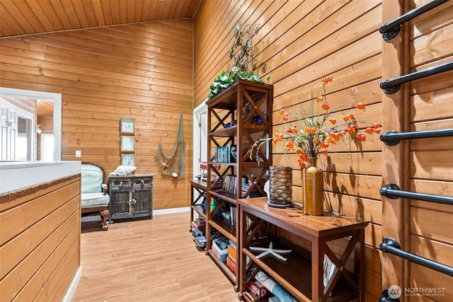 8116 Naketa Beach Walk, Mukilteo, WA 98275 - interior space featuring wooden walls, wood ceiling, light wood-type flooring, and vaulted ceiling