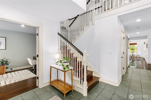 1014 Cherry Ave NE, Bainbridge Island, WA 98110 - stairway featuring tile patterned flooring, recessed lighting, and baseboards