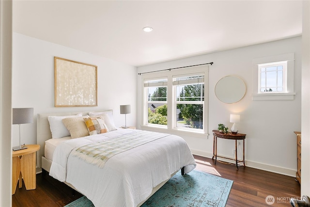 1014 Cherry Ave NE, Bainbridge Island, WA 98110 - bedroom featuring multiple windows, dark wood-style flooring, baseboards, and recessed lighting
