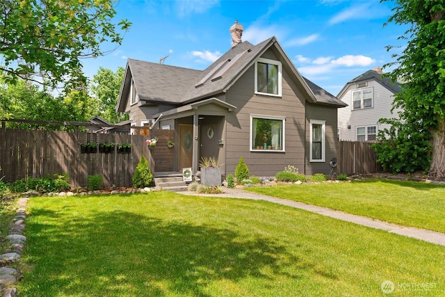 605 N Sampson St, Ellensburg, WA 98926 - view of front of house featuring a chimney and roof with shingles