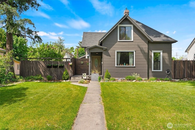 605 N Sampson St, Ellensburg, WA 98926 - view of front of home with a chimney and roof with shingles