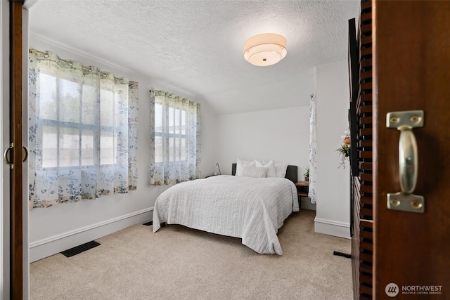 605 N Sampson St, Ellensburg, WA 98926 - bedroom with a textured ceiling, carpet, and baseboards