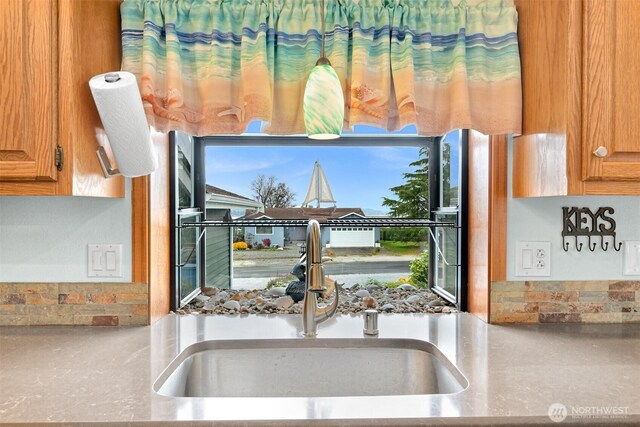 8061 Niska Rd, Blaine, WA 98230 - detailed view of a sink and brown cabinetry