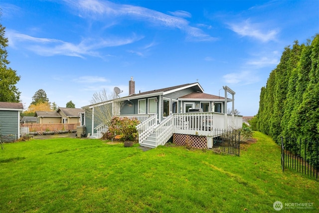 8061 Niska Rd, Blaine, WA 98230 - rear view of house featuring a chimney and a wooden deck