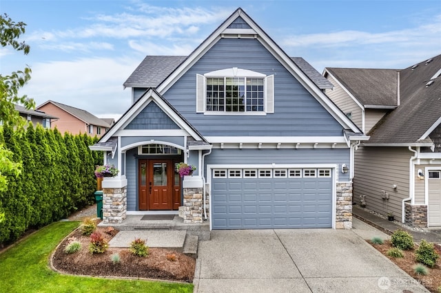 30630 122nd Ave SE, Auburn, WA 98092 - craftsman inspired home featuring stone siding, concrete driveway, and a garage