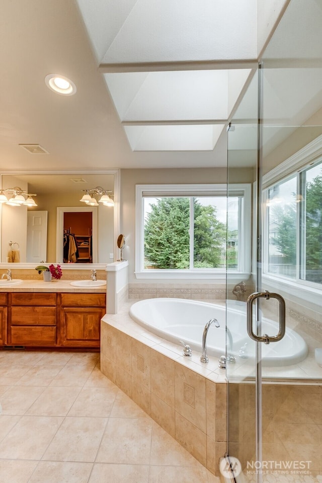 30630 122nd Ave SE, Auburn, WA 98092 - bathroom featuring plenty of natural light, tile patterned flooring, a bath, double vanity, and recessed lighting