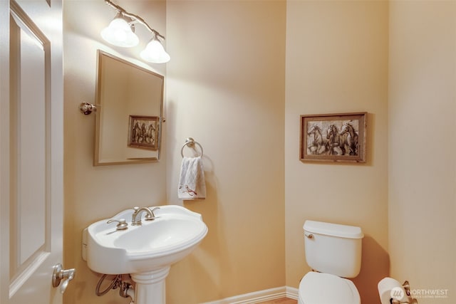 30630 122nd Ave SE, Auburn, WA 98092 - bathroom with toilet, baseboards, and a sink