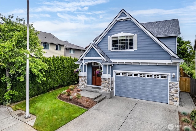 30630 122nd Ave SE, Auburn, WA 98092 - view of front of house featuring stone siding, concrete driveway, an attached garage, and a shingled roof