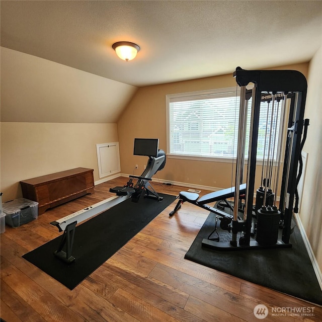 30630 122nd Ave SE, Auburn, WA 98092 - exercise room with hardwood / wood-style flooring, baseboards, and vaulted ceiling