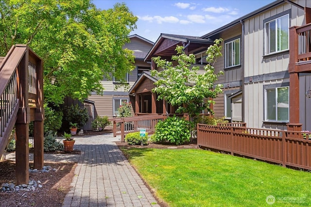 21307 48th Ave W Unit C206, Mountlake Terrace, WA 98043 - surrounding community featuring a yard