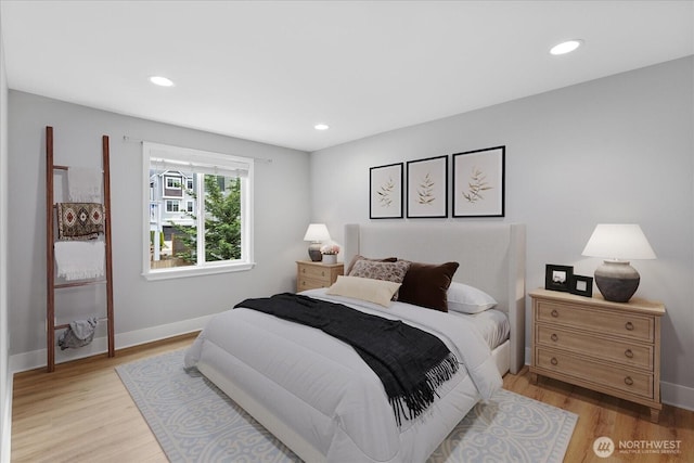 21307 48th Ave W Unit C206, Mountlake Terrace, WA 98043 - bedroom with light wood-style flooring, baseboards, and recessed lighting