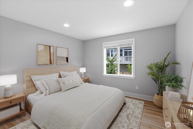 21307 48th Ave W Unit C206, Mountlake Terrace, WA 98043 - bedroom featuring wood finished floors, baseboards, and recessed lighting