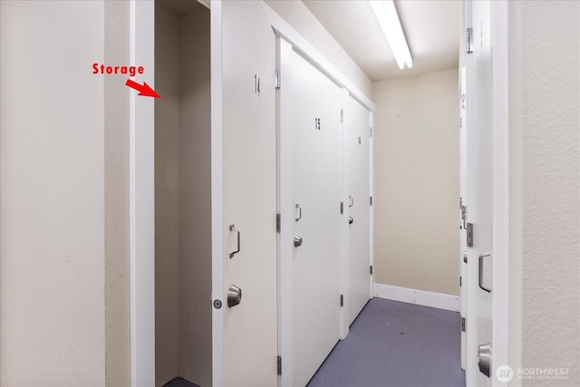 21307 48th Ave W Unit C206, Mountlake Terrace, WA 98043 - hallway featuring finished concrete floors