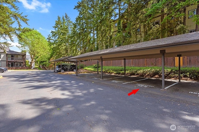 21307 48th Ave W Unit C206, Mountlake Terrace, WA 98043 - view of covered parking lot