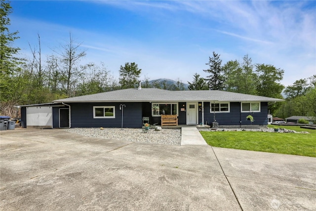16015 Lange Rd, Mount Vernon, WA 98273 - single story home with a front yard, driveway, an attached garage, and a porch