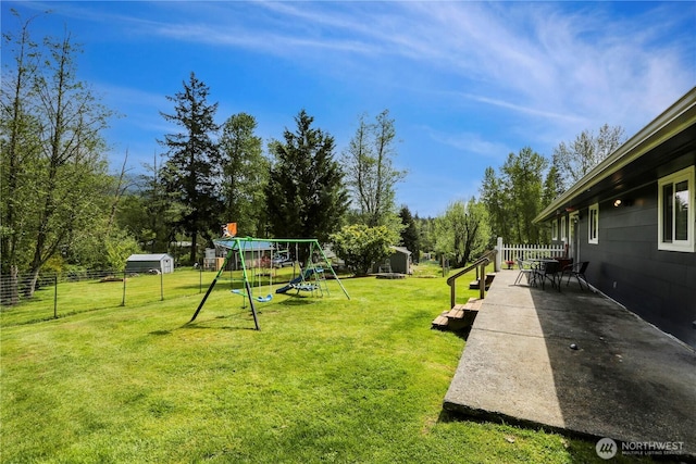 16015 Lange Rd, Mount Vernon, WA 98273 - view of yard featuring a playground and view of wooded area