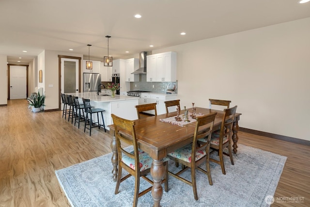 1048 Malvern Hills Dr, Camano Island, WA 98282 - dining area with light wood-type flooring, baseboards, and recessed lighting