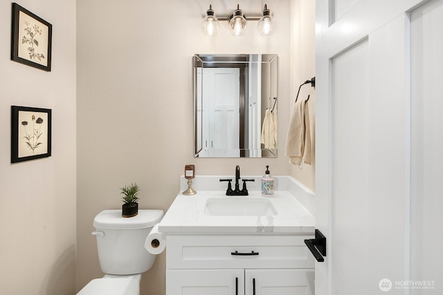 1048 Malvern Hills Dr, Camano Island, WA 98282 - half bathroom featuring toilet and vanity