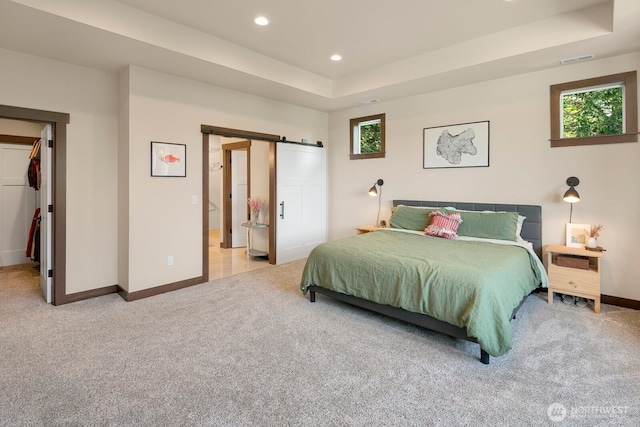 1048 Malvern Hills Dr, Camano Island, WA 98282 - bedroom featuring a barn door, light carpet, baseboards, and recessed lighting