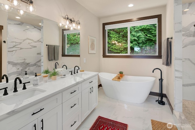 1048 Malvern Hills Dr, Camano Island, WA 98282 - full bathroom with marble finish floors, a freestanding bath, double vanity, and a marble finish shower
