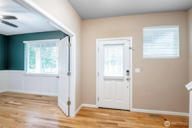 7628 Kodiak Ave NE, Lacey, WA 98516 - foyer with ceiling fan and light wood-style floors