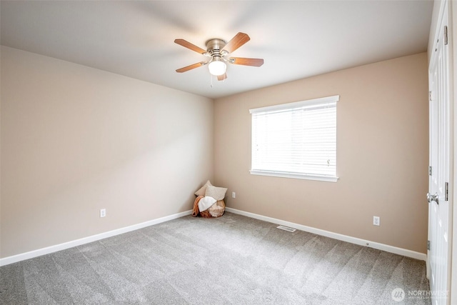 7628 Kodiak Ave NE, Lacey, WA 98516 - empty room with ceiling fan and carpet floors