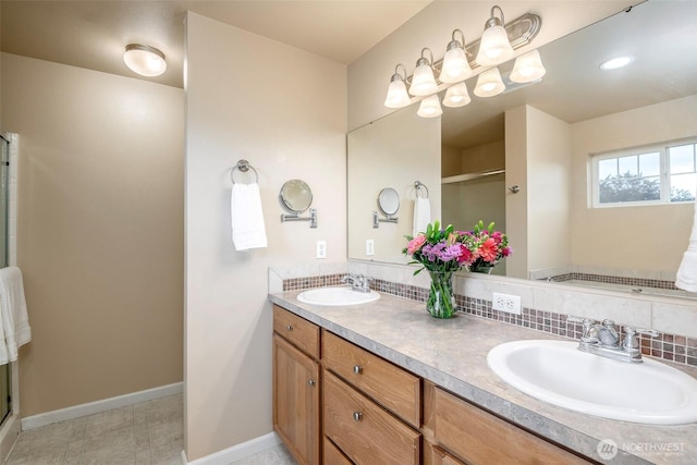 7628 Kodiak Ave NE, Lacey, WA 98516 - bathroom with backsplash, a stall shower, and double vanity