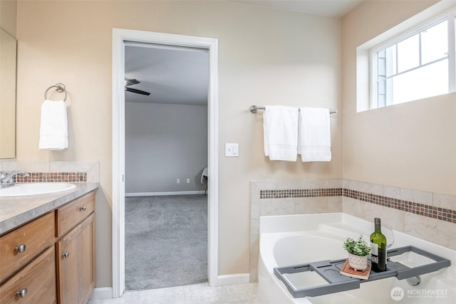 7628 Kodiak Ave NE, Lacey, WA 98516 - full bath featuring vanity, a bath, and decorative backsplash