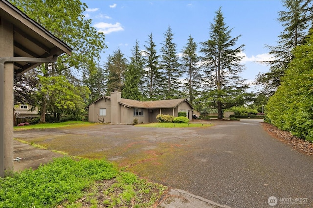 13849 SE 10th St, Bellevue, WA 98005 - view of front of house featuring a chimney