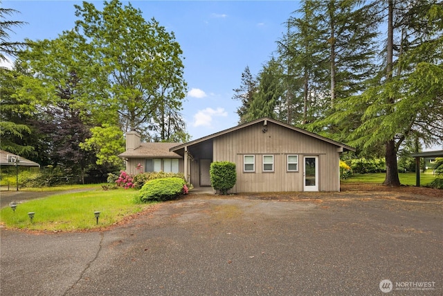 13849 SE 10th St, Bellevue, WA 98005 - view of front of property with a chimney and a front lawn