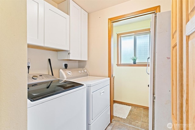 25420 354th Ave SE, Ravensdale, WA 98051 - laundry area featuring cabinet space, washer and clothes dryer, and baseboards