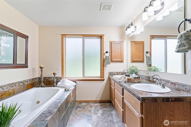 25420 354th Ave SE, Ravensdale, WA 98051 - bathroom featuring double vanity, a jetted tub, and baseboards