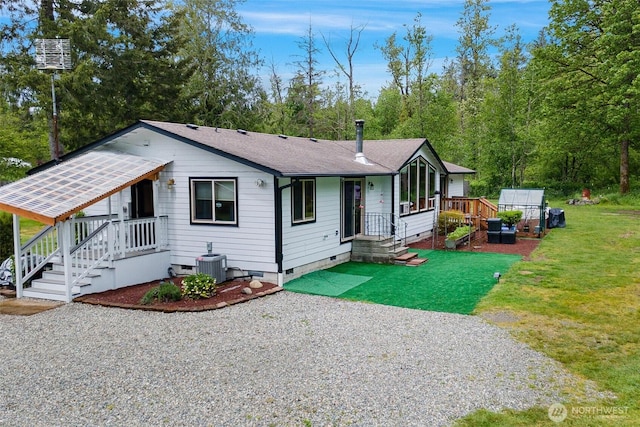 25420 354th Ave SE, Ravensdale, WA 98051 - view of front of home with crawl space, a shingled roof, a front yard, and central AC unit