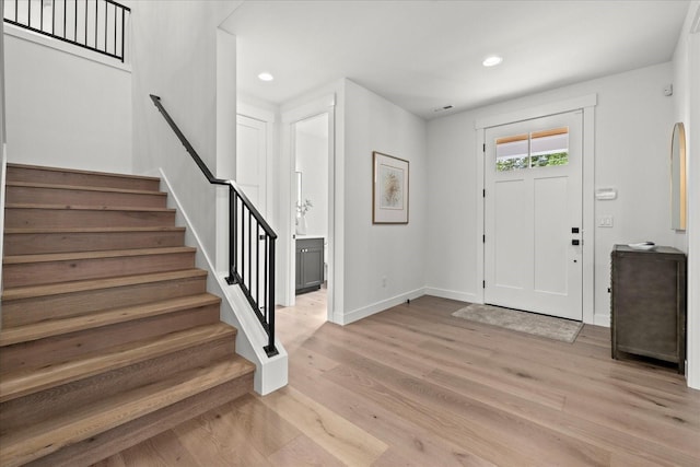 11440 109th Ave NE, Kirkland, WA 98033 - foyer entrance with stairway, light wood-style flooring, baseboards, and recessed lighting