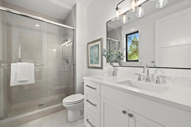 11440 109th Ave NE, Kirkland, WA 98033 - full bathroom featuring vanity, toilet, a shower stall, and tile patterned flooring