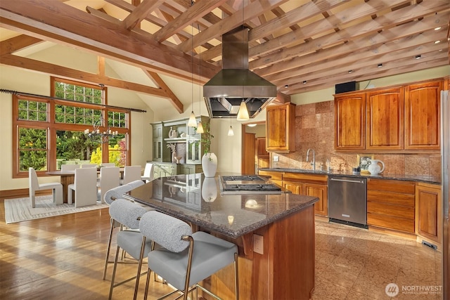 26970 SE Old Black Nugget Rd, Issaquah, WA 98029 - kitchen with appliances with stainless steel finishes, brown cabinets, island exhaust hood, a kitchen island, and tasteful backsplash