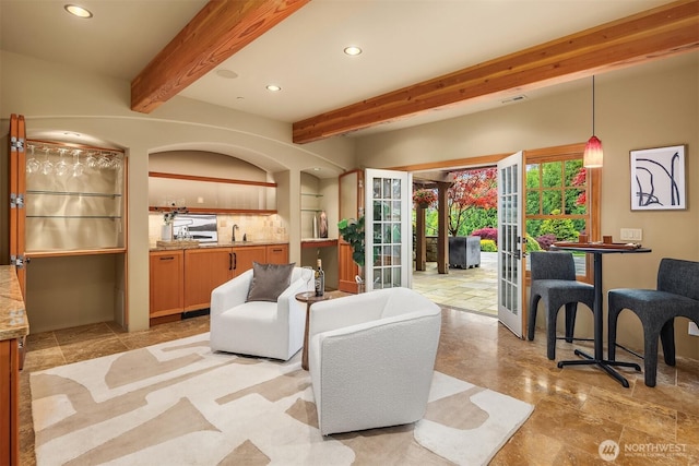 26970 SE Old Black Nugget Rd, Issaquah, WA 98029 - living area with recessed lighting, beam ceiling, and french doors