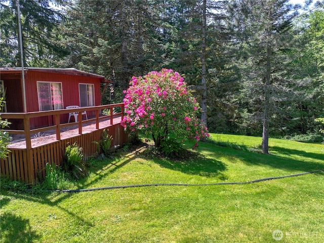 132 Claudine Ct, Kelso, WA 98626 - view of green lawn with a wooden deck and a wooded view