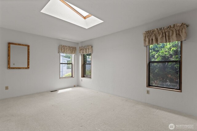 11436SE 208th St Unit 180, Kent, WA 98031 - unfurnished room with a skylight and carpet flooring