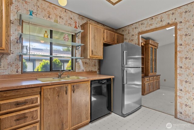11436SE 208th St Unit 180, Kent, WA 98031 - kitchen with dishwasher, wallpapered walls, freestanding refrigerator, open shelves, and a sink