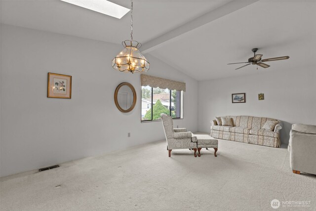 11436SE 208th St Unit 180, Kent, WA 98031 - carpeted living area with a chandelier, a skylight, and ceiling fan
