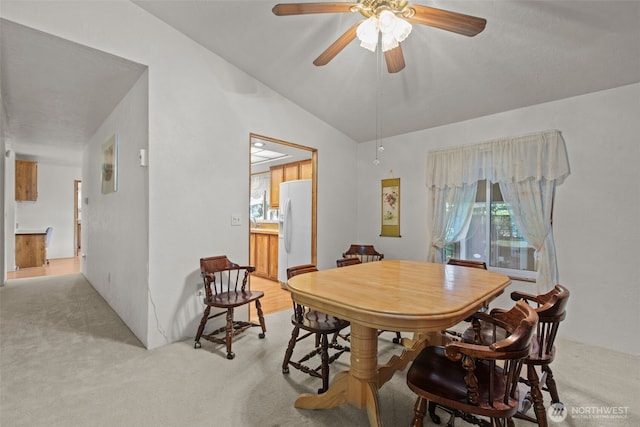 11436SE 208th St Unit 188, Kent, WA 98031 - dining space featuring light colored carpet, a ceiling fan, and lofted ceiling