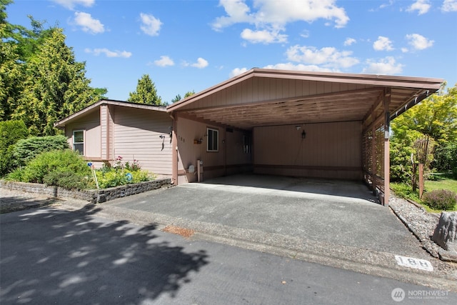 11436SE 208th St Unit 188, Kent, WA 98031 - view of front facade featuring asphalt driveway and an attached carport