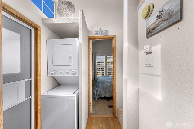 7704 Birch Bay Dr Unit 2805, Blaine, WA 98230 - washroom with estacked washer and dryer and wood finished floors