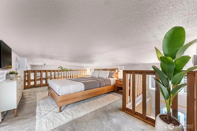 7704 Birch Bay Dr Unit 2805, Blaine, WA 98230 - bedroom with light carpet and a textured ceiling