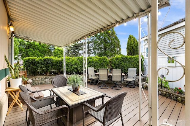 7704 Birch Bay Dr Unit 2805, Blaine, WA 98230 - wooden terrace with outdoor dining area and a fenced backyard