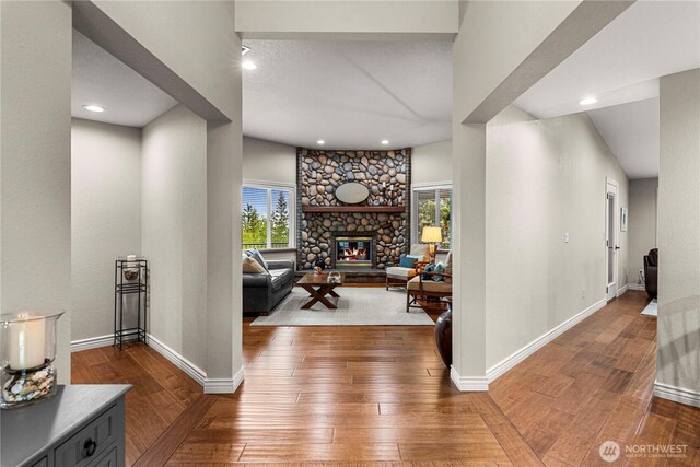 6753 Forest Ridge Dr, Wenatchee, WA 98801 - corridor with hardwood / wood-style floors, baseboards, plenty of natural light, and recessed lighting