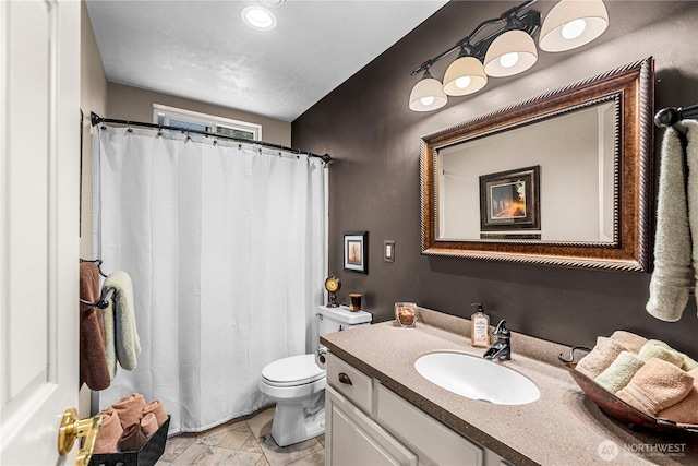 6753 Forest Ridge Dr, Wenatchee, WA 98801 - full bath featuring toilet, vanity, tile patterned flooring, and curtained shower