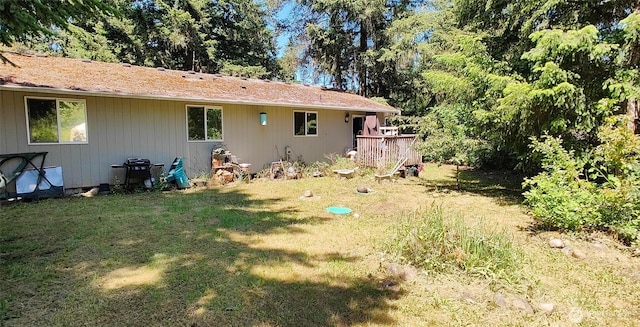 17046 Filbert Ct SE, Yelm, WA 98597 - rear view of property with a yard and a deck