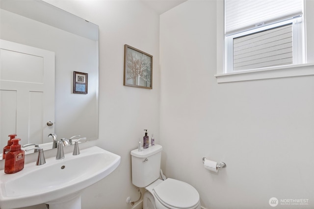 18230 134th Ave E, Puyallup, WA 98374 - half bathroom featuring a sink and toilet